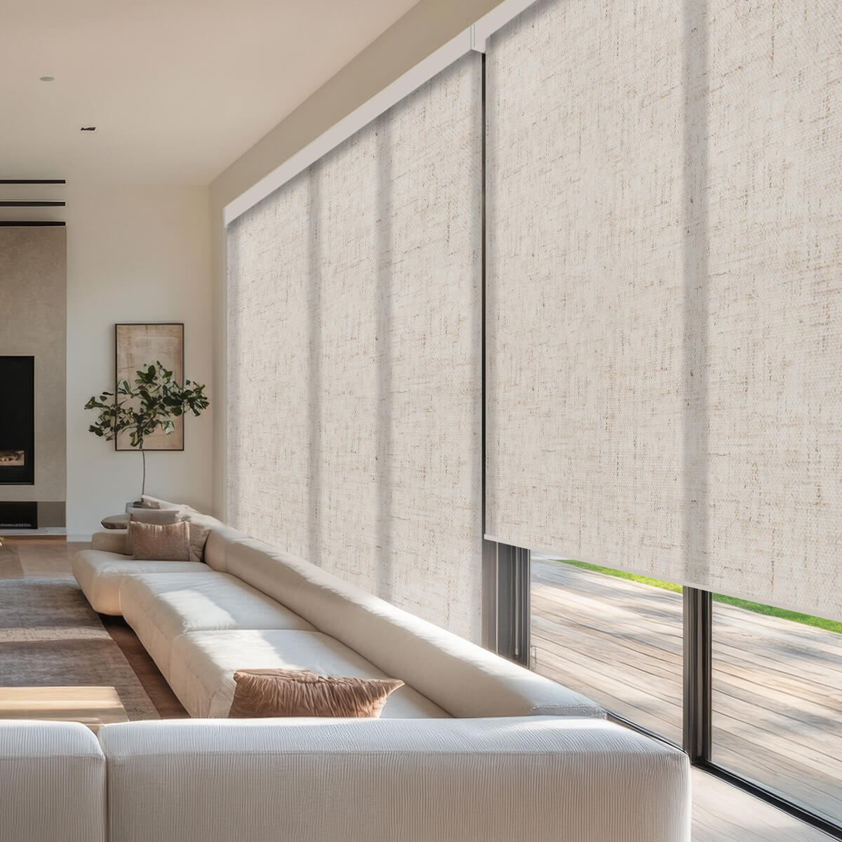Motorized roller shades on tall living room windows, a sleek alternative to soft-fold roman shades