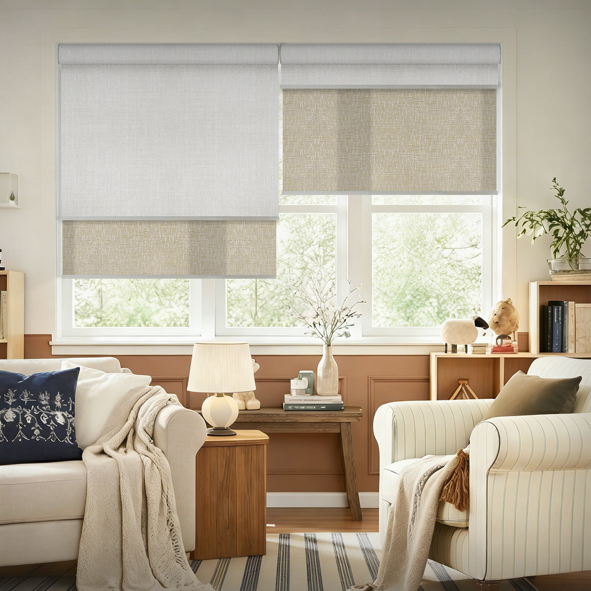 Reading and work nook with bookshelves, armchairs and motorized dual shades softening daylight from a wide window